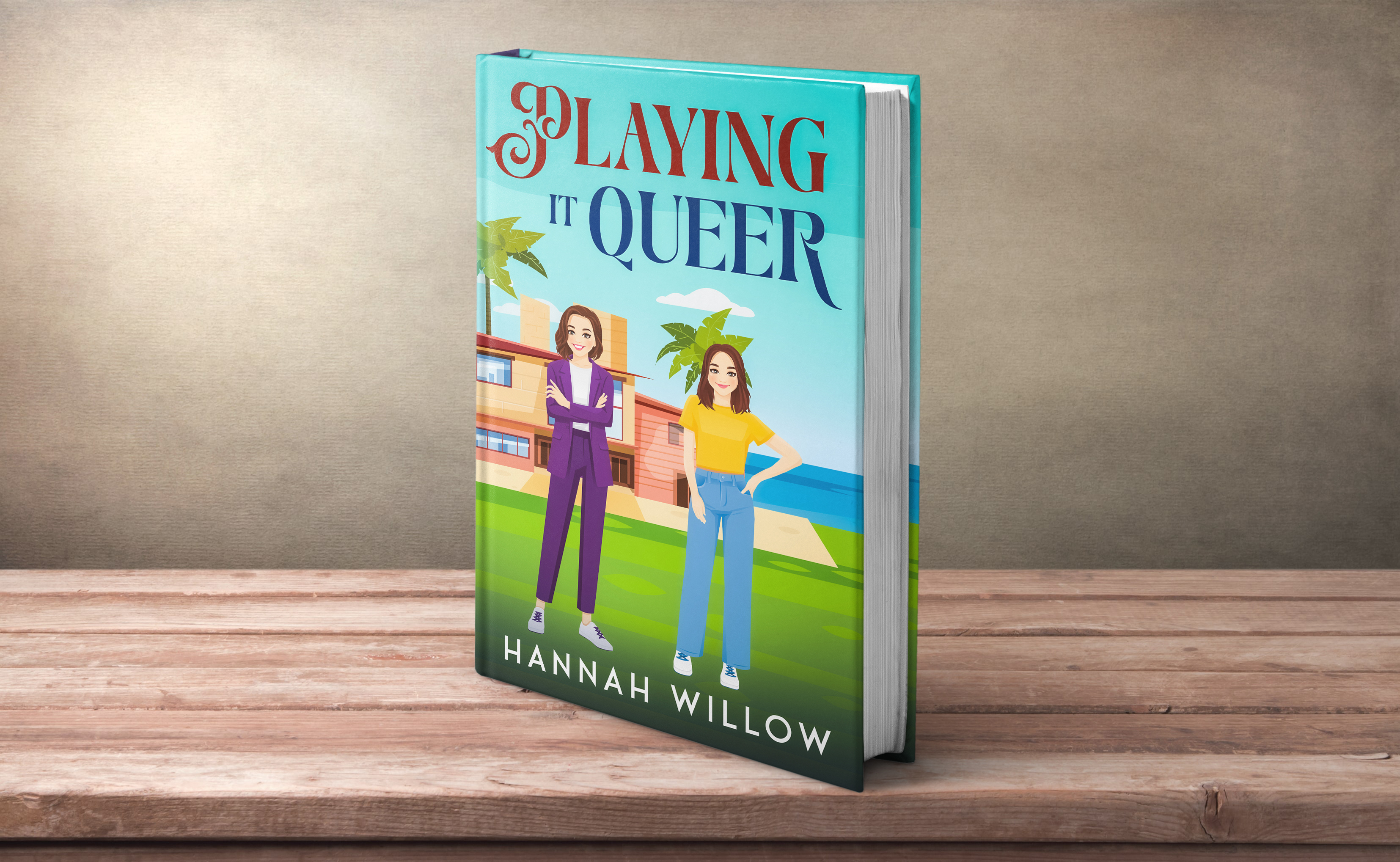 The book, Playing it Queer, by Hannah Willow, sitting on a 